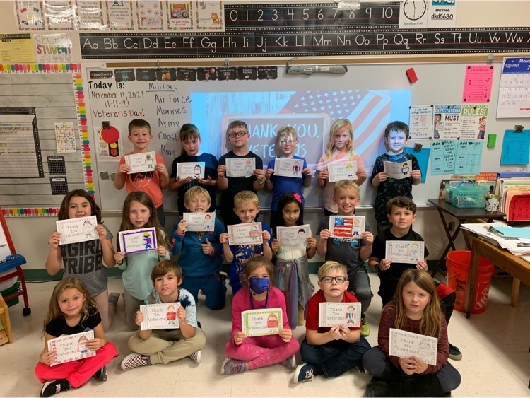 Miss Johnson’s class holds up their Veterans Day activity.