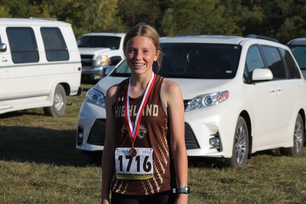 AJ Caudill sporting her 8th place medal from the Elsberry Invitational on Monday 9/25/23